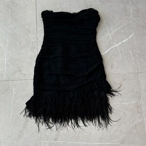 Elegant Black Strapless Dress with Feather Detail